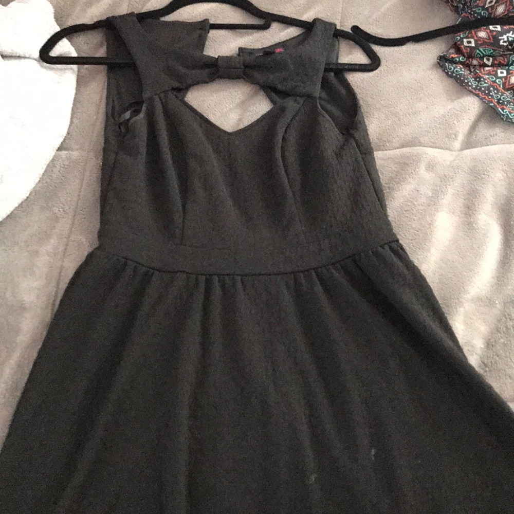 Black dress with a bow neckline